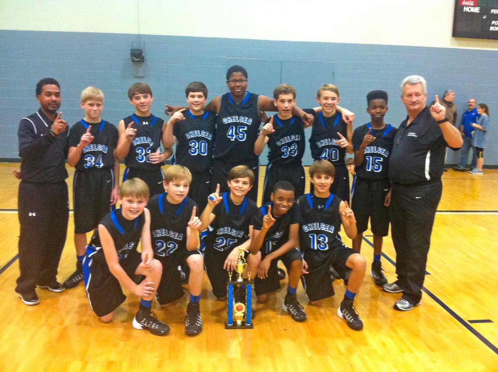 Chelsea Middle School boys basketball team displays the 2014 Southern Conference Champion