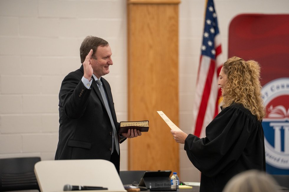 Shelby County Schools board member David Bobo being sworn in.